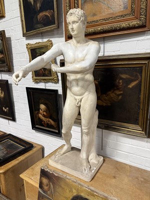 Lot 8 - A PLASTER SCULPTURE OF THE ATHLETE APOXYOMENOS AFTER THE ORIGINAL BY LYSIPPOS