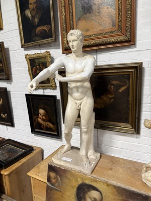 Lot 8 - A PLASTER SCULPTURE OF THE ATHLETE APOXYOMENOS AFTER THE ORIGINAL BY LYSIPPOS