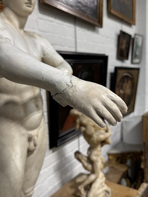 Lot 8 - A PLASTER SCULPTURE OF THE ATHLETE APOXYOMENOS AFTER THE ORIGINAL BY LYSIPPOS