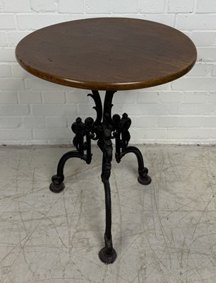 Lot 912 - A CAST IRON PUB TABLE WITH CIRCULAR WOODEN TOP