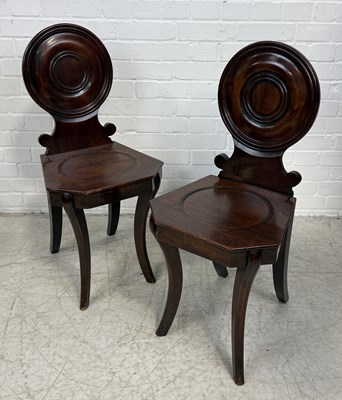 Lot 865 - A PAIR OF REGENCY MAHOGANY HALL CHAIRS