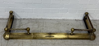 Lot 987 - A BRASS FIRE FENDER