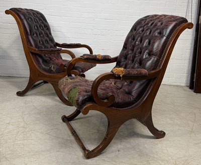 Lot 968 - A PAIR OF SLIPPER ARMCHAIRS UPHOLSTERED IN OX BLOOD BUTTON BACK LEATHER