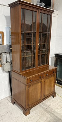 Lot 953 - A 19TH CENTURY MAHOGANY BOOKCASE WITH GLASS DOORS