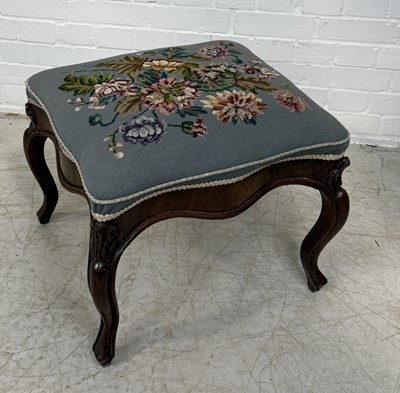 Lot 940 - AN ANTIQUE MAHOGANY FOOTSTOOL UPHOLSTERED IN FLORAL NEEDLEPOINT FABRIC