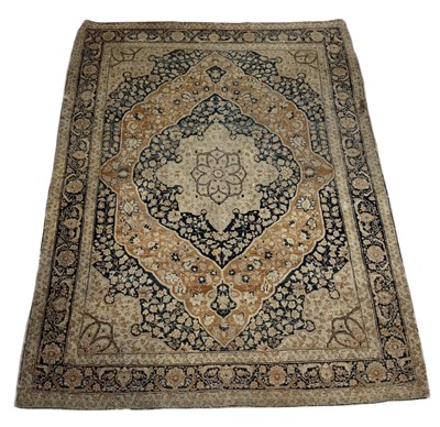 Lot 903 - AN ANTIQUE PERSIAN CARPET