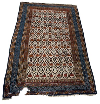 Lot 904 - AN ANTIQUE PERSIAN CARPET