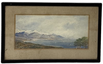 Lot 593 - A WATERCOLOUR PAINTING ON PAPER DEPICTING A CONTINENTAL SEA AND MOUNTAIN VIEW WITH SAILING CRAFT AND COASTAL TOWN BY THE SHORES