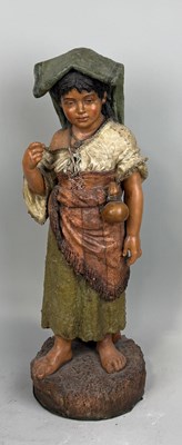 Lot 338 - A TERRACOTTA SCULPTURE OF A GIRL IN TRADITIONAL DRESS