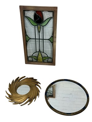 Lot 936 - A STAINED GLASS PANEL, SPIRAL WALL MIRROR AND CIRCULAR WALL MIRROR