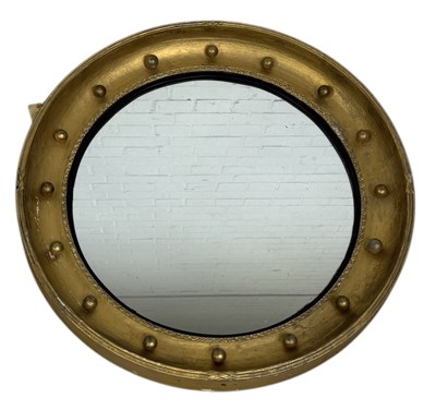 Lot 933 - A REGENCY-STYLE CIRCULAR WALL MIRROR