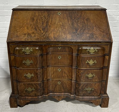 Lot 1017 - AN 18TH CENTURY WALNUT SERPENTINE BUREAU