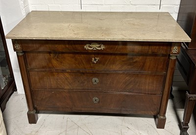 Lot 1014 - A FRENCH EMPIRE COMMODE WITH MARBLE TOP