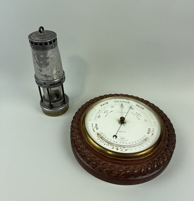 Lot 331 - A BAROMETER AND A MINER'S LAMP