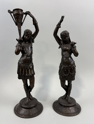 Lot 333 - A PAIR OF EGYPTIAN REVIVAL BRONZE SCULPTURES OF LADY'S CARRYING VASES