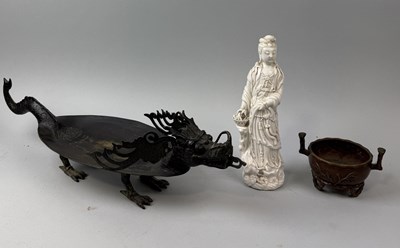 Lot 221 - A CHINESE BLANC DE CHINE FIGURE OF GUANYIN, A BRONZE DRAGON AND CENSER