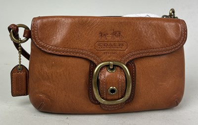 Lot 690 - A COACH TAN LEATHER MINI HAND BAG ALONG WITH A PURSE (2)