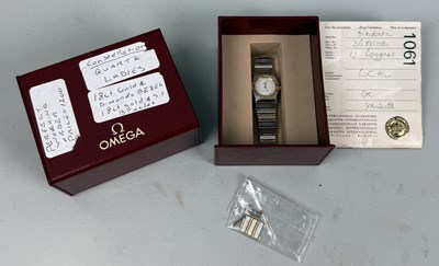 Lot 144 - AN OMEGA CONSTELLATION WATCH WITH DIAMOND BEZEL AND GOLD AND STAINLESS STEEL BRACELET