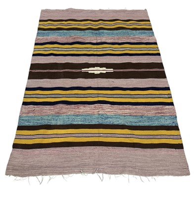 Lot 957 - A COTTON RUG IN PASTEL SHADES