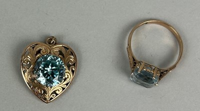 Lot 172A - A CHINESE GOLD RING WITH BLUE STONE ALONG WITH A MATCHING HEART PENDANT