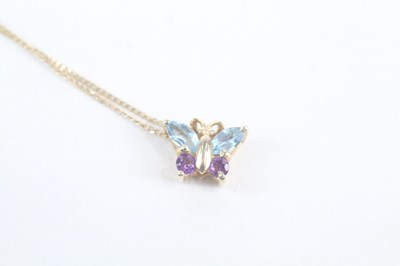 Lot 123 - A 9CT GOLD TOPAZ AND AMETHYST BUTTERFLY PENDANT NECKLACE