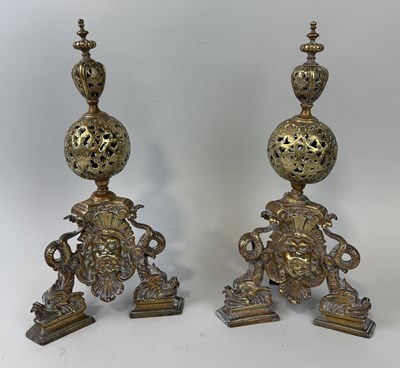 Lot 403 - A PAIR OF 19TH CENTURY BRONZE FIRE DOGS WITH DOLPIN LEGS AND MASK