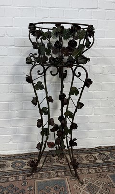 Lot 826 - AN IRON GARDEN PLANT STAND, DECORATED WITH ROSES AND LEAVES