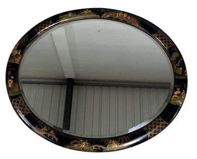 Lot 827 - AN EARLY 20TH CENTURY CHINOISERIE BLACK LACQUERED WALL MIRROR