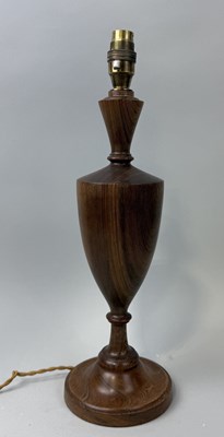 Lot 824 - A HEAVY WOODEN URN LAMP