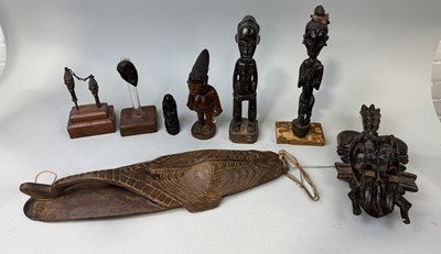 Lot 81 - A COLLECTION OF TRIBAL WOODEN FIGURES