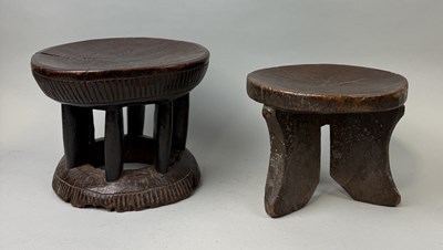 Lot 123 - TWO AFRICAN HARDWOOD MILKING STOOLS