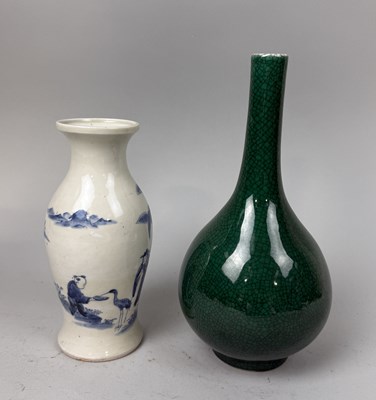 Lot 183 - TWO CHINESE VASES, ONE GREEN CRACKLE GLAZED THE OTHER BLUE AND WHITE DECORATED WITH FIGURES