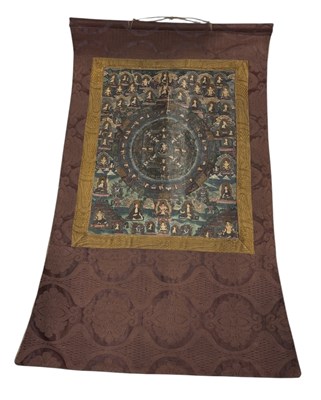 Lot 92 - AN EARLY 20TH CENTURY PAINTED THANGKA ON HANGING SCROLL