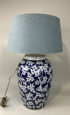 Lot 984 - A CHINESE BLUE AND WHITE PRUNUS VASE ADAPTED FOR A LAMP