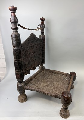 Lot 120 - AN ANTIQUE HARD WOOD PIDDHA CHAIR WITH WOVEN SEAT