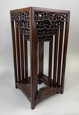 Lot 104 - AN EARLY 20TH CENTURY CHINESE WOODEN NEST OF TABLES