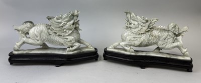 Lot 158 - A PAIR OF CHINESE JADE DRAGONS ON STANDS