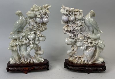 Lot 155 - A PAIR OF CHINESE JADE SCULPTURES DEPICTING BIRDS ON BRANCHES WITH FRUIT