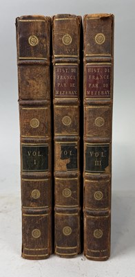 Lot 296 - MEZERAY: A GENERAL CHRONOLOGICAL HISTORY OF FRANCE, VOL I, II AND III, BROWN LEATHER BOUND