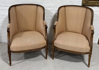 Lot 777 - `A PAIR OF FRENCH BERGERE ARMCHAIRS, POSSIBLY BEECHWOOD UPHOLSTERED IN A PALE PINK FABRIC