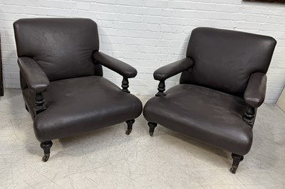 Lot 747 - A PAIR OF HOWARD STYLE ARMCHAIRS