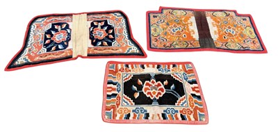 Lot 115 - THREE TIBETAN CARPET FRAGMENTS