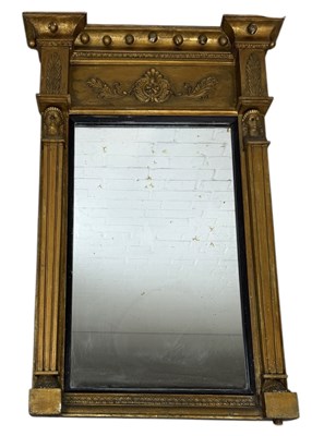 Lot 734 - A REGENCY PERIOD EGYPTIAN REVIVAL WALL MIRROR