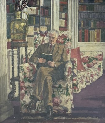 Lot 539 - AN OIL PAINTING ON CANVAS DEPICTING A SEATED GENTLEMAN READING A BOOK IN A CHINTZ ARMCHAIR