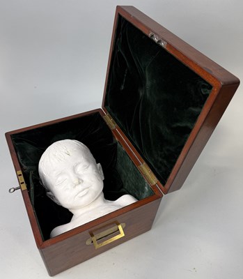 Lot 421 - A PLASTER DEATH MASK OF A YOUNG BOY, IN MAHOGANY CASE