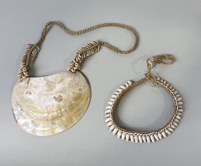 Lot 375 - AN OCEANIC KISA SHELL ALONG WITH A SHELL NECKLACE, POSSIBLY PAPUA NEW GUINEA