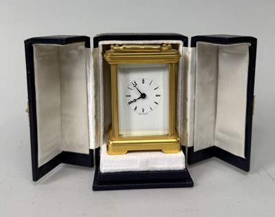 Lot 362 - A BRASS CARRIAGE CLOCK PRESENTED AS A DIPLOMATIC GIFT BY QUEEN ELIZABETH II