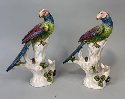 Lot 387 - A PAIR OF PAINTED PORCELAIN PARROTS