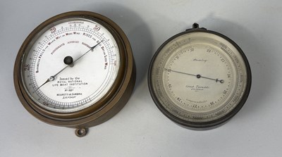 Lot 363 - NEGRETTI AND ZAMBRA: A FISHERMAN'S ANEROID BAROMETER, TOGETHER WITH A COMPENSATED ANEROID BAROMETER BY STANLEY OF LONDON