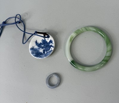 Lot 878B - A CHINESE JADE BANGLE, CHINESE RINGS, CHINESE CERAMIC PENDANT